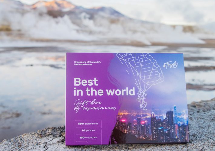 Tinggly Best in world gift box sitting in a mountainous setting